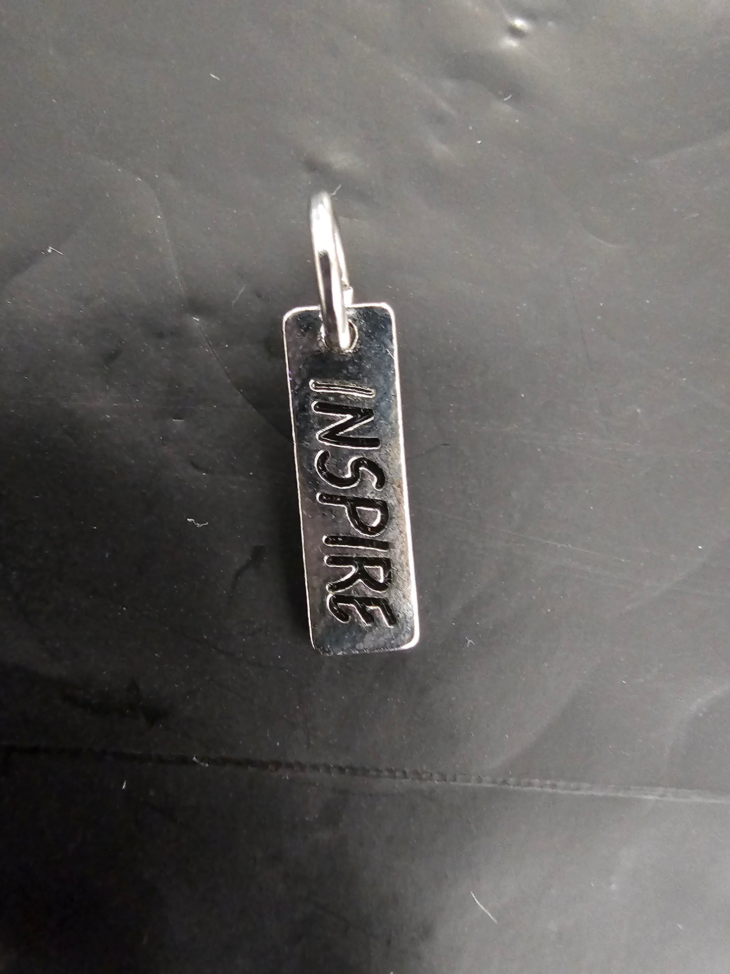 Words of Wisdom Charm